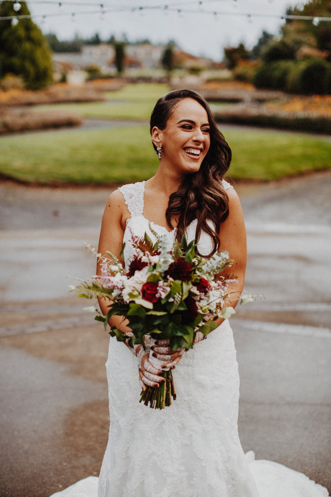 A bride with her bouquet and hena at the Oregon Garden Resort