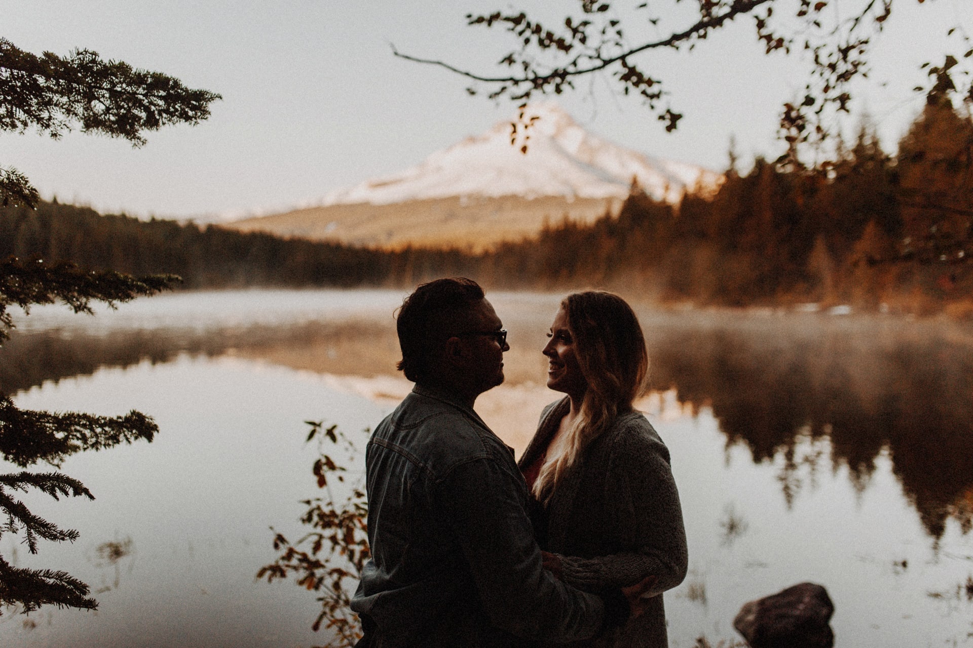 Couple at trillium lake and view of mount hood