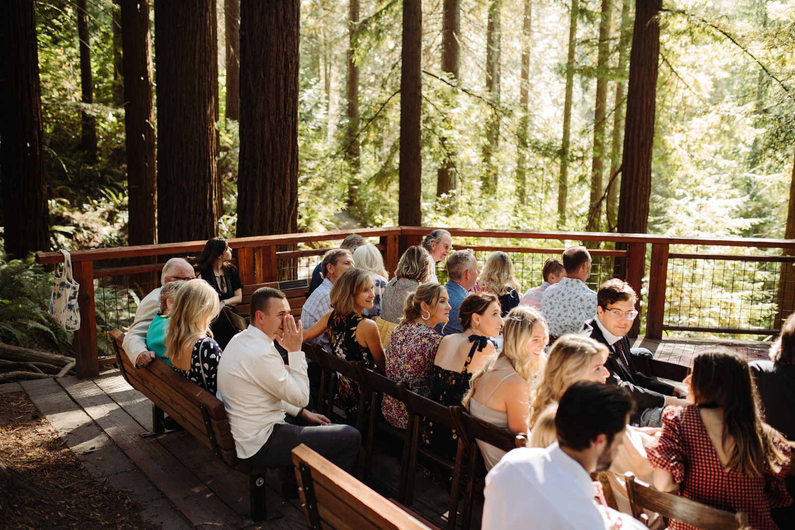 guests seated for a wedding at the hoyt arboretum redwood deck